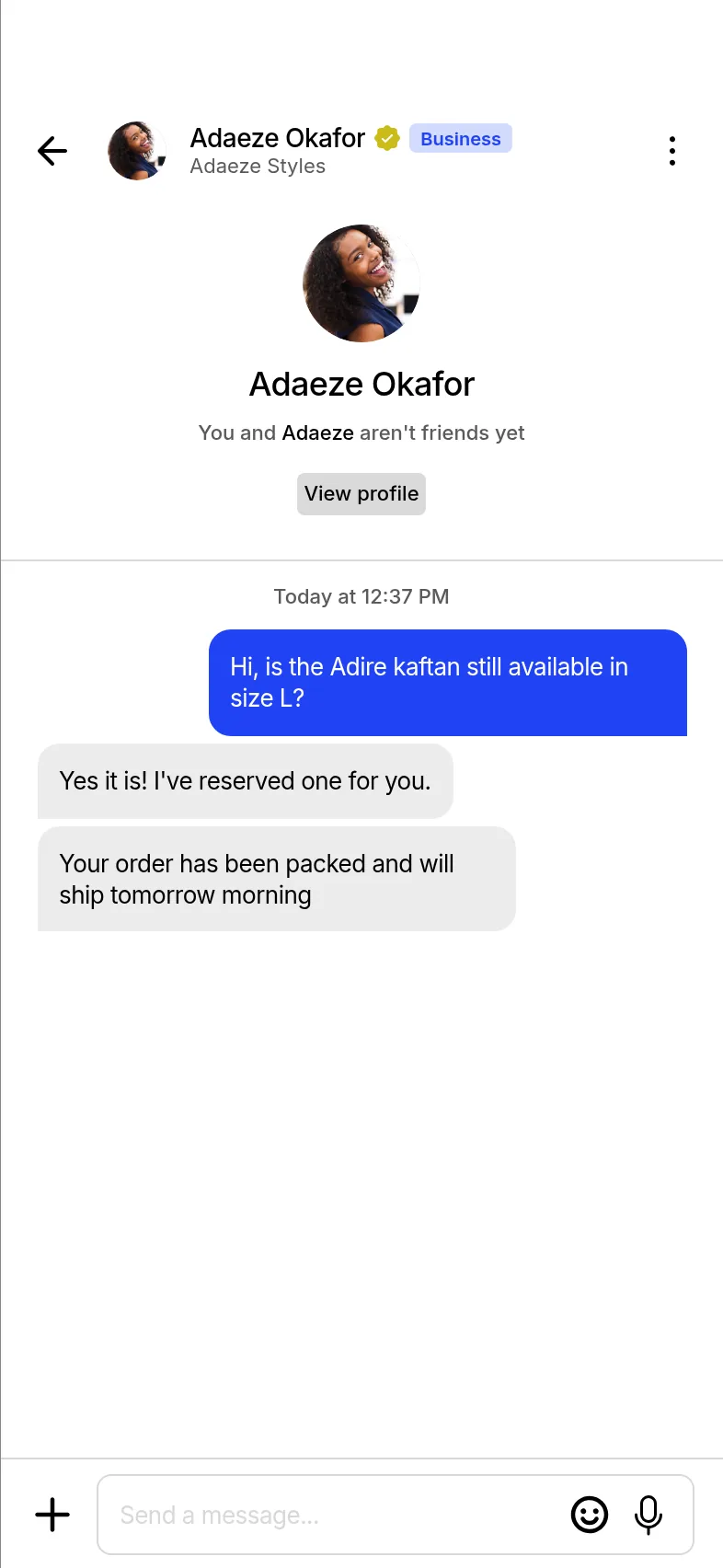 Chat with Adaeze Styles asking if an Adire kaftan is available in size L